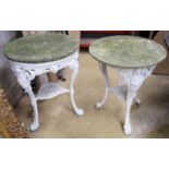 A pair of cast iron circular marble top tables, diameter 60cm, height 72cm