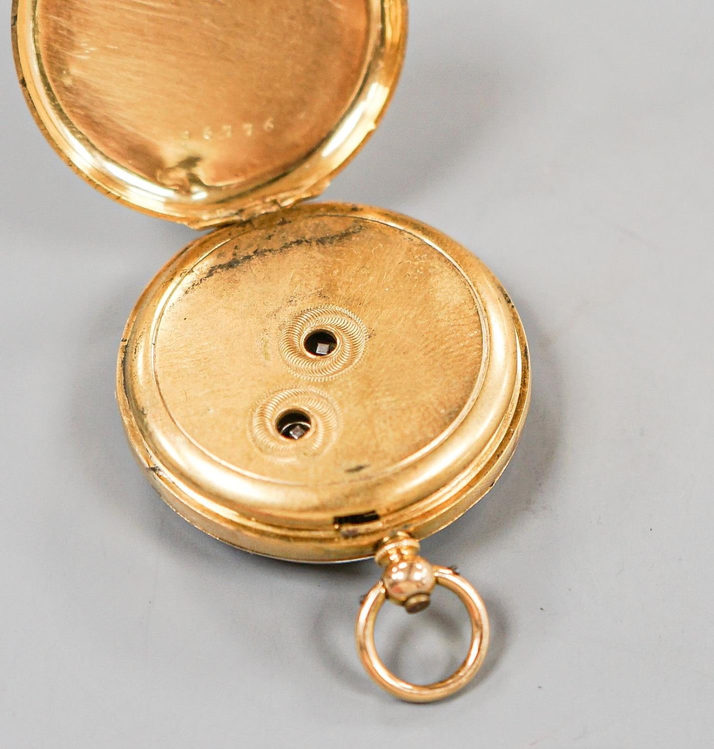 A continental yellow metal, enamel and diamond chip set open face fob watch, decorated en verso with - Image 4 of 4