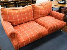 A contemporary patterned red fabric two seater settee, length 180cm, depth 100cm, height 92cm