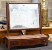 A George IV inlaid mahogany bow fronted box base toilet mirror, width 57cm, depth 22cm, height 62cm
