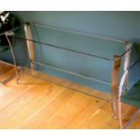 An Art Deco style bronze and glass two tier console table, width 153cm depth 44cm height 73cm