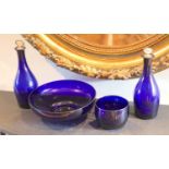 A pair of Bristol blue glass decanters with mother of pearl stoppers, height 28cm, a bowl,