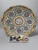 A decorative Moroccan pottery dish and a quantity of Middle Eastern glass beads and 10 turned wooden