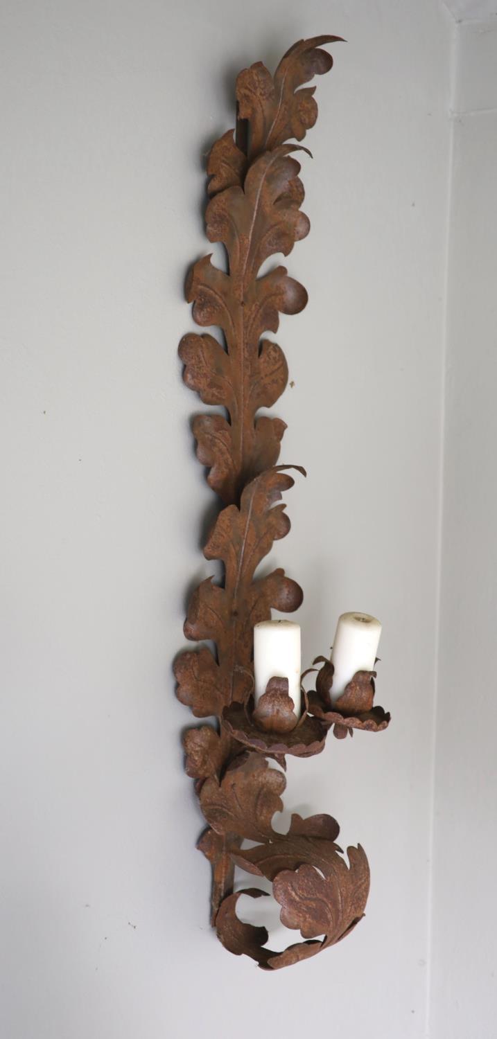 A pair of oxidised metal acanthus leaf wall sconces, width 30cm height 118cm