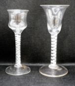 Two George III opaque twist stem cordial glasses, c.1760, each with a double series opaque twist