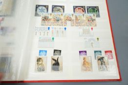 A blue album of George V mounted mint British Commonwealth stamps, one other album and two stock