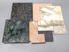 A group of cut stone coasters (with other located throughout the property)