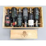 13 various bottles of port including Taylor’s 1975 vintage, Dow’s 1964, Noval etc.