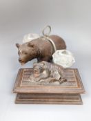 A Black forest carved bear cruet, width 13cm, and a similar stampbox, early 20th century