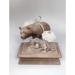 A Black forest carved bear cruet, width 13cm, and a similar stampbox, early 20th century