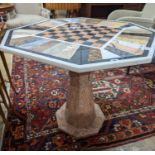 A modern octagonal specimen marble games table, width 91cm, depth 78cm