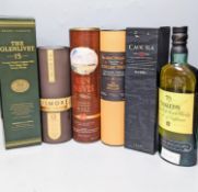 Six assorted single malt whiskies including The Macphails Collection 8 year old, The Glenlivet