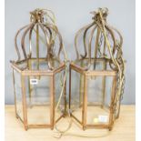 A pair of brass hexagonal lanterns 54cm