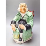 A Victorian earthenware character jug, The old lamp lighter 23cm
