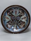 Jonathan Chiswell-Jones. A pomegranate pattern reduction fired lustre charger, numbered 4232,