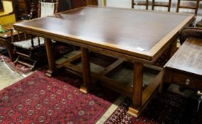 A large rectangular oak dining or boardroom table on six column supports (From The Wills Cigarette