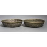 A pair of Indonesian embossed silvered metal circular bowls,Dia 22.5cm