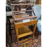 A 20th century two-tier table with scumbled finish, width 51cm, depth 51cm, height 68cm together