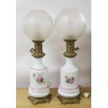 A pair of Napoleon III porcelain converted oil lamps. 59cm