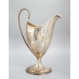 A George III Irish silver pedestal cream jug, George West, Dublin, 1794, 18cm, 7oz.