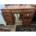 A late Victorian mahogany walnut kneehole desk, length 114cm, depth 55cm, height 78cm