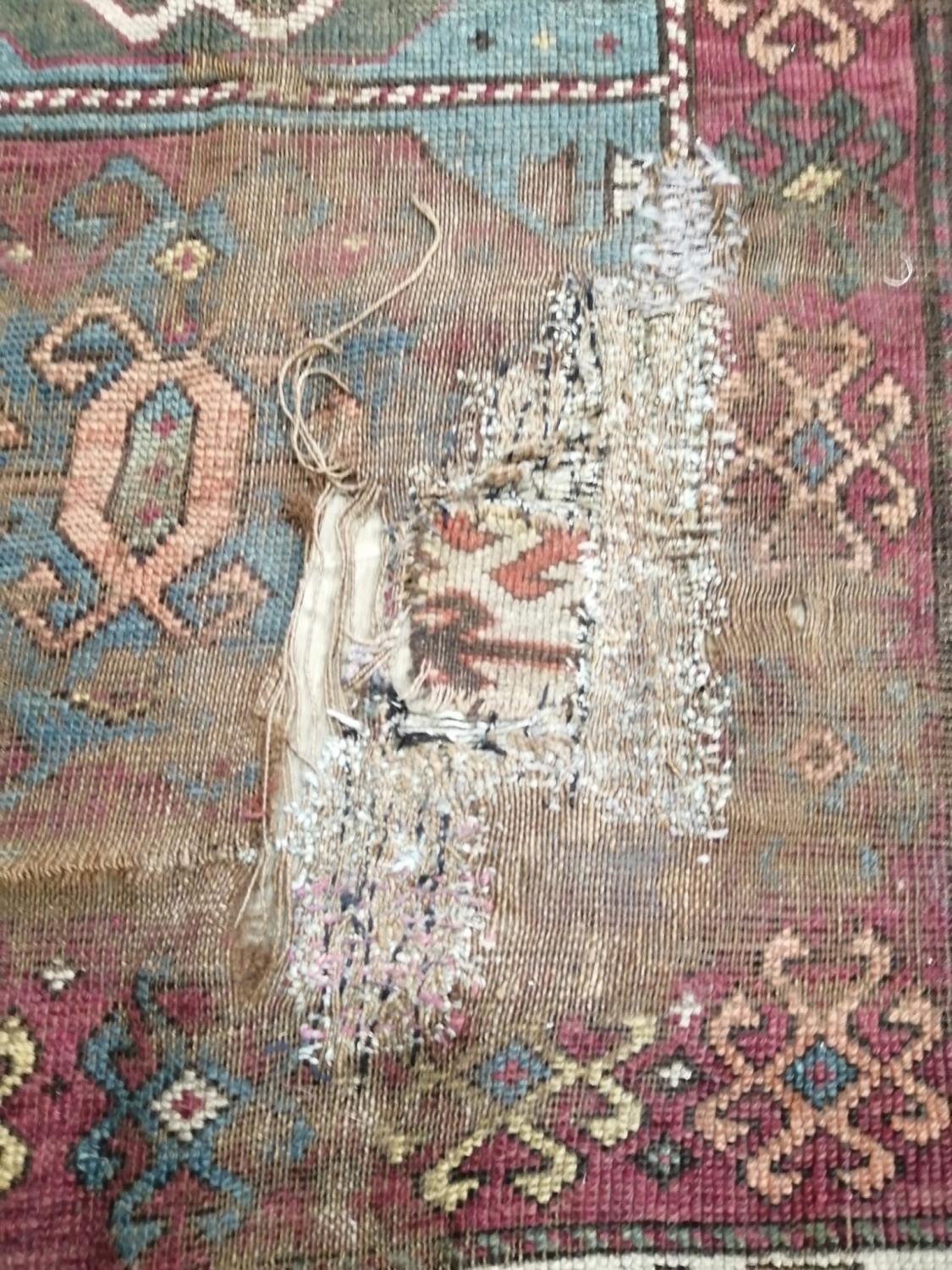 An antique Kazak rug, 310 x 150cm - Image 2 of 7