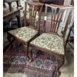 A pair of mid 18th century mahogany dining chairs