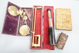 A Chinese carved sandalwood card case, a cased set of Avery gold scales, a Zonex telescope, a