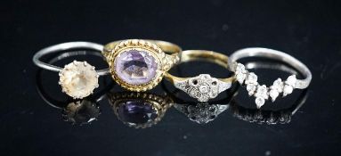 A Victorian yellow metal and amethyst dress ring (shank a.f.), gross 2.6 grams, size P/Q, a small