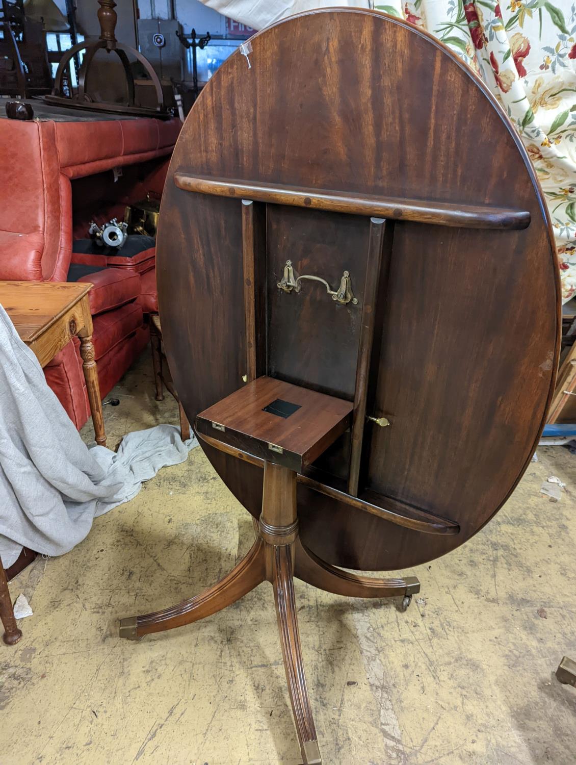 Attributed to William Tillman. A reproduction George III style oval mahogany pedestal tilt top - Image 3 of 4