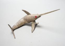 A 20th century Spanish articulated white metal model of a swordfish, with red glass eyes, approx.
