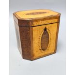 A George III octagonal sycamore and rosewood panelled tea caddy. 13cm