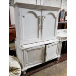 A painted four door cabinet, width 118cm, depth 60cm, height 152cm