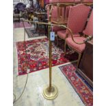 An Edwardian brass telescopic floor lamp converted to electricity