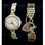 A 9ct. yellow gold chain bracelet, 9.7 grams and a lady's 9ct gold watch on a 9ct and metal core