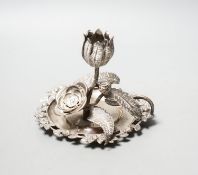 A George IV silver ‘rose’ chamberstick by Sampson Mordan and George Riddle, London, 1829, diameter