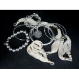 A small group of white metal and 925 jewellery including torsade necklace and bracelet, etc,