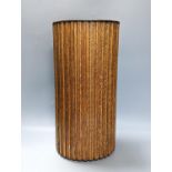 An unusual slatted oak and laminated wood stick stand 47cm