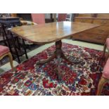 A Regency banded mahogany rectangular tilt top dining table, length 121cm, depth 82cm, height 71cm