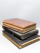 Two early 20th century postcard albums, a photo album and a collection of loose postcards