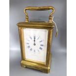 A French brass carriage clock, retailed by John Bennett, height 12cm