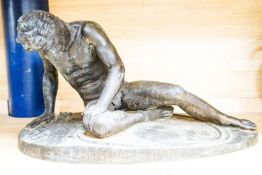 After the Antique, A late 19th/early 20th century bronze group ‘The Dying Gaul’ 55cm