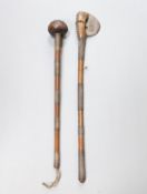 A Zulu hardwood, braided wire and studded knobkerrie and a similar axe 79cm