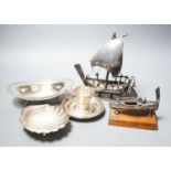 A silver butter shell and a pierced silver dish, two coin dishes and two boat models etc.