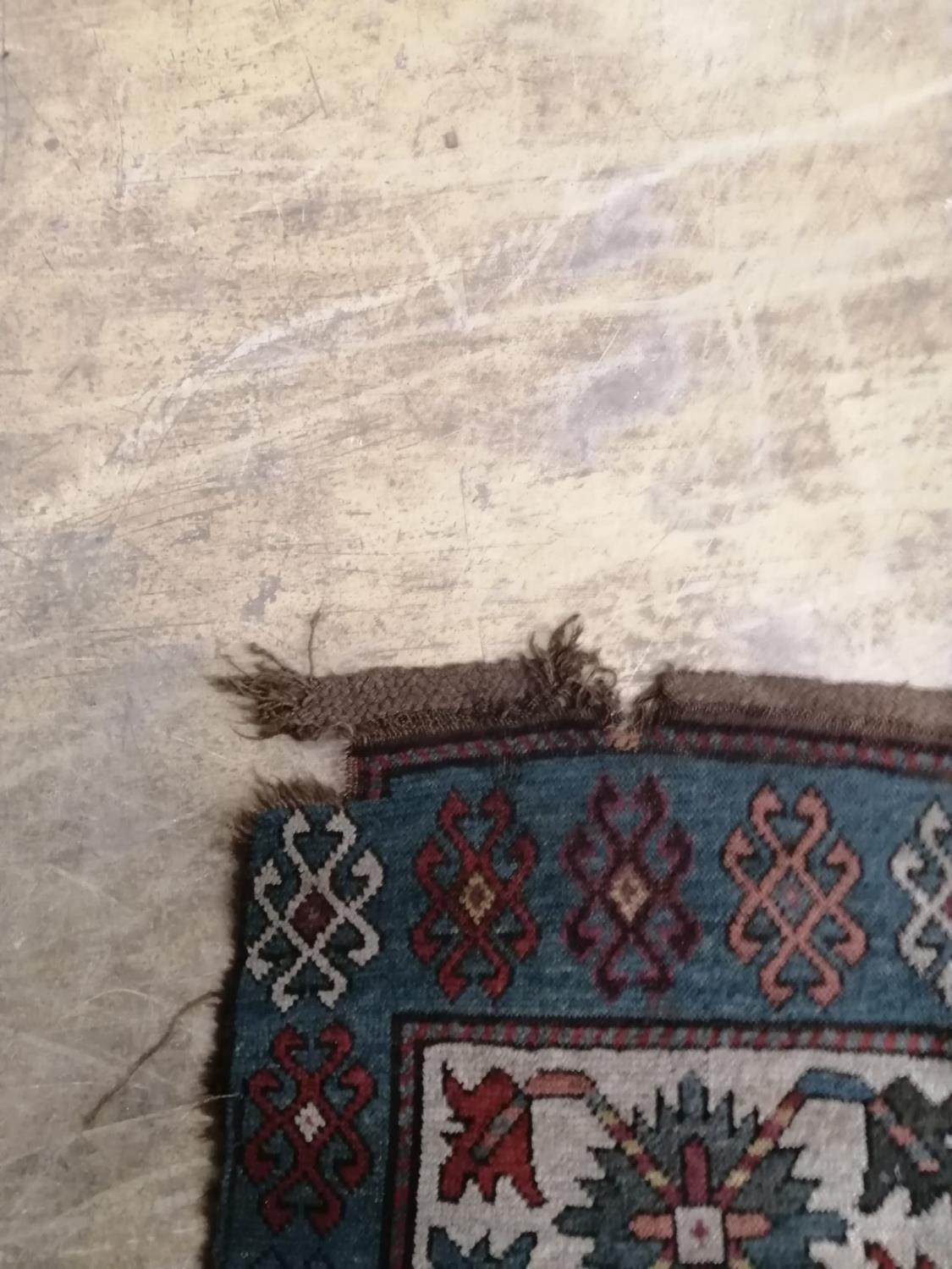 An antique Kazak rug, 310 x 150cm - Image 5 of 7