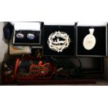 A quantity of costume jewellery in two cases.