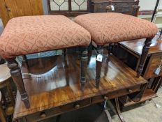 A pair of Regency rectanuglar mahogany upholstered dressing stools, length 50cm, depth 42cm,