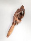 An 18th/19th century fruitwood 'squirrel' nut cracker, 16.3cm