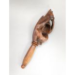 An 18th/19th century fruitwood 'squirrel' nut cracker, 16.3cm