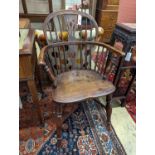 A mid 19th century Windsor yew and elm Windsor elbow chair, width 58cm, depth 42cm, height 91cm